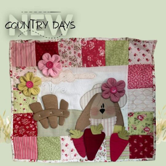 CONTANIGLIO COPRIFUOCHI, pannello imbottito e decorato con applicazione primaverile